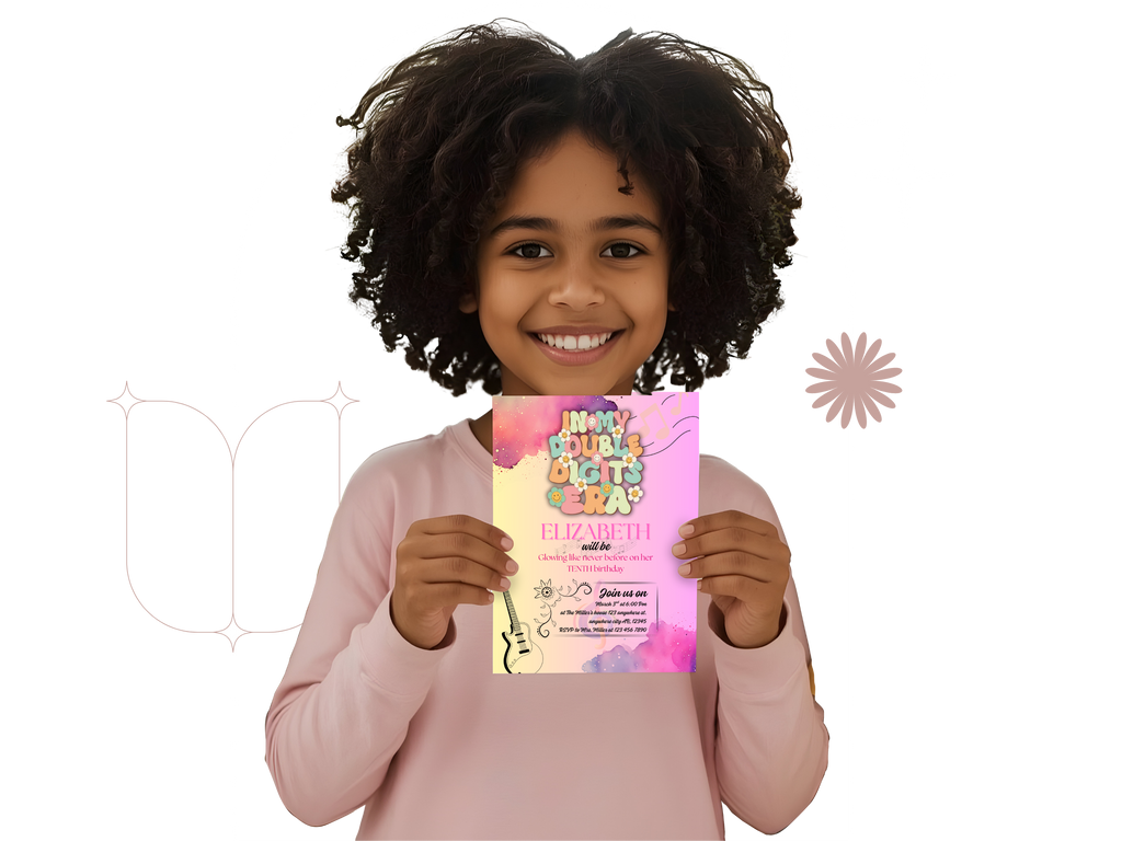 Child holding a colorful card with text on a white background